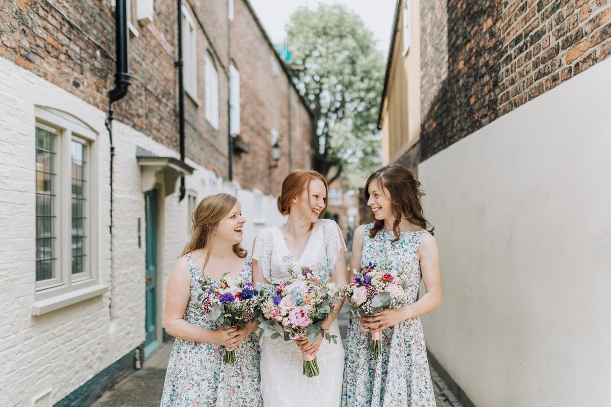 13 Bridesmaids wearing Liberty fabric dresses