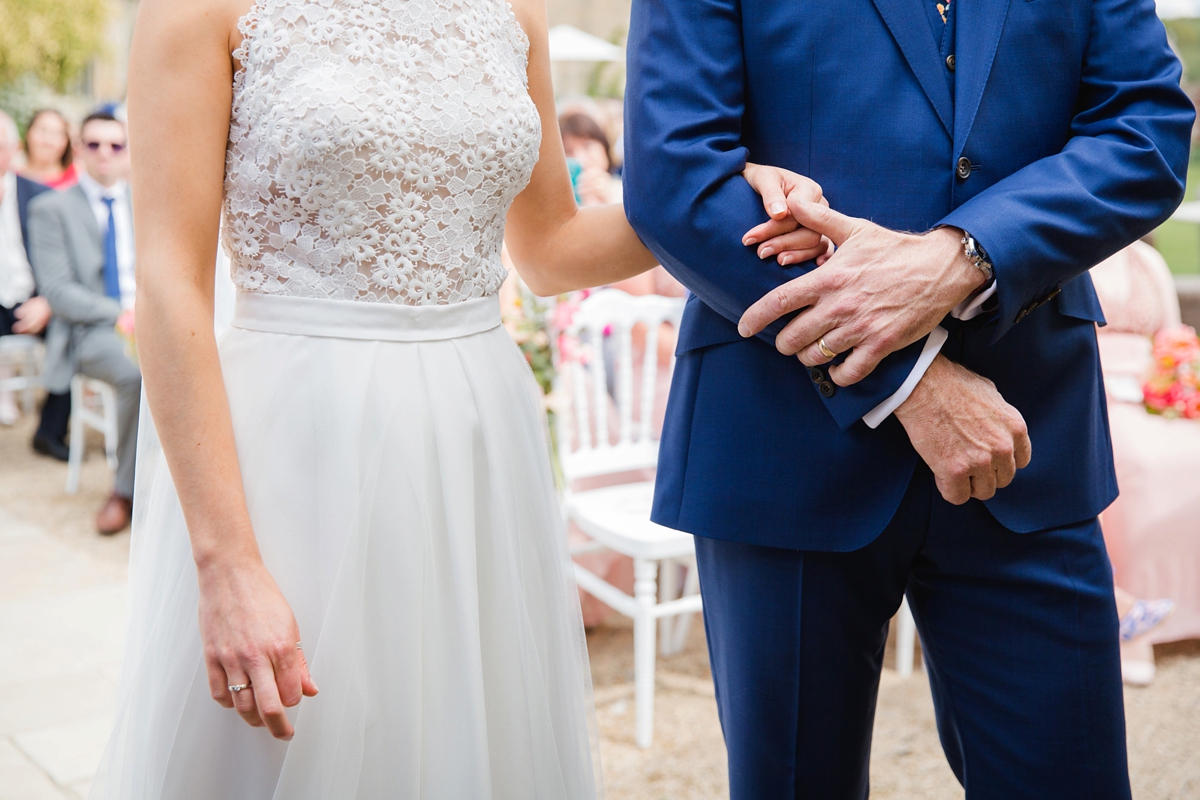 14 Couple embracing during their outdoor wedding ceremony 1