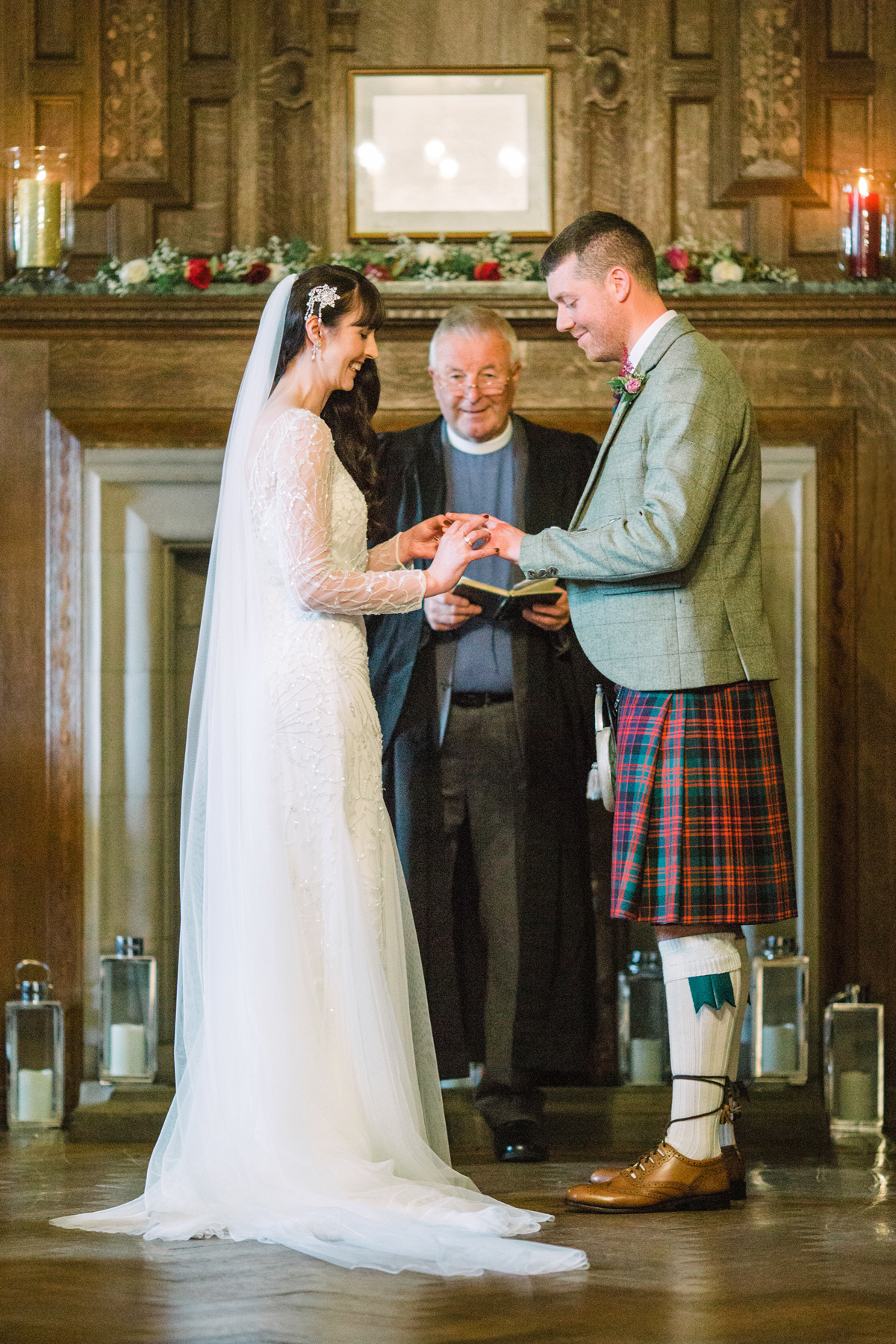 16 Bride and groom exchanging vows and rings at Rowallan Castle Scotland