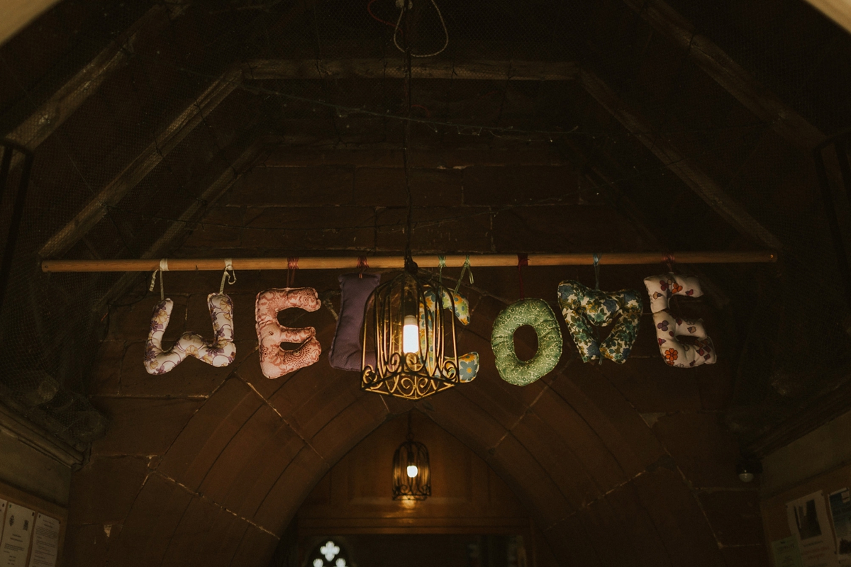 16 Handmade welcome sign made from cushions in letter shapes