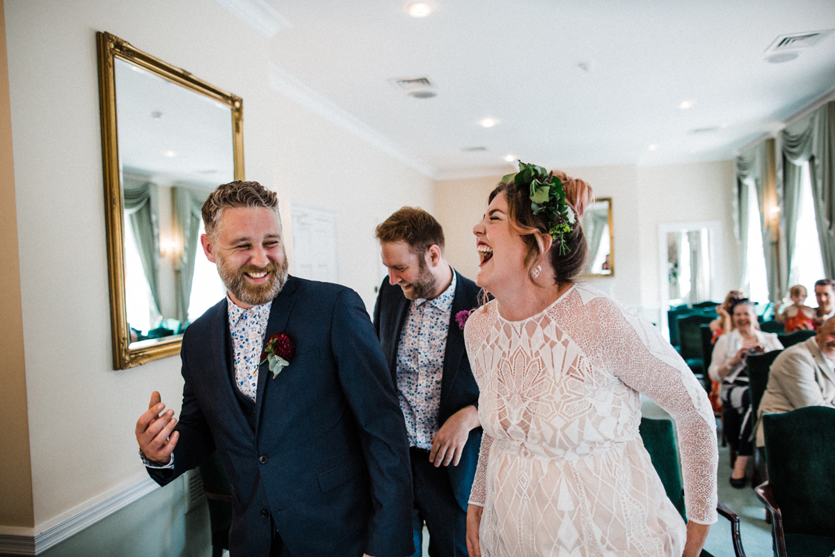 17 Newlywed bride and groom laughing