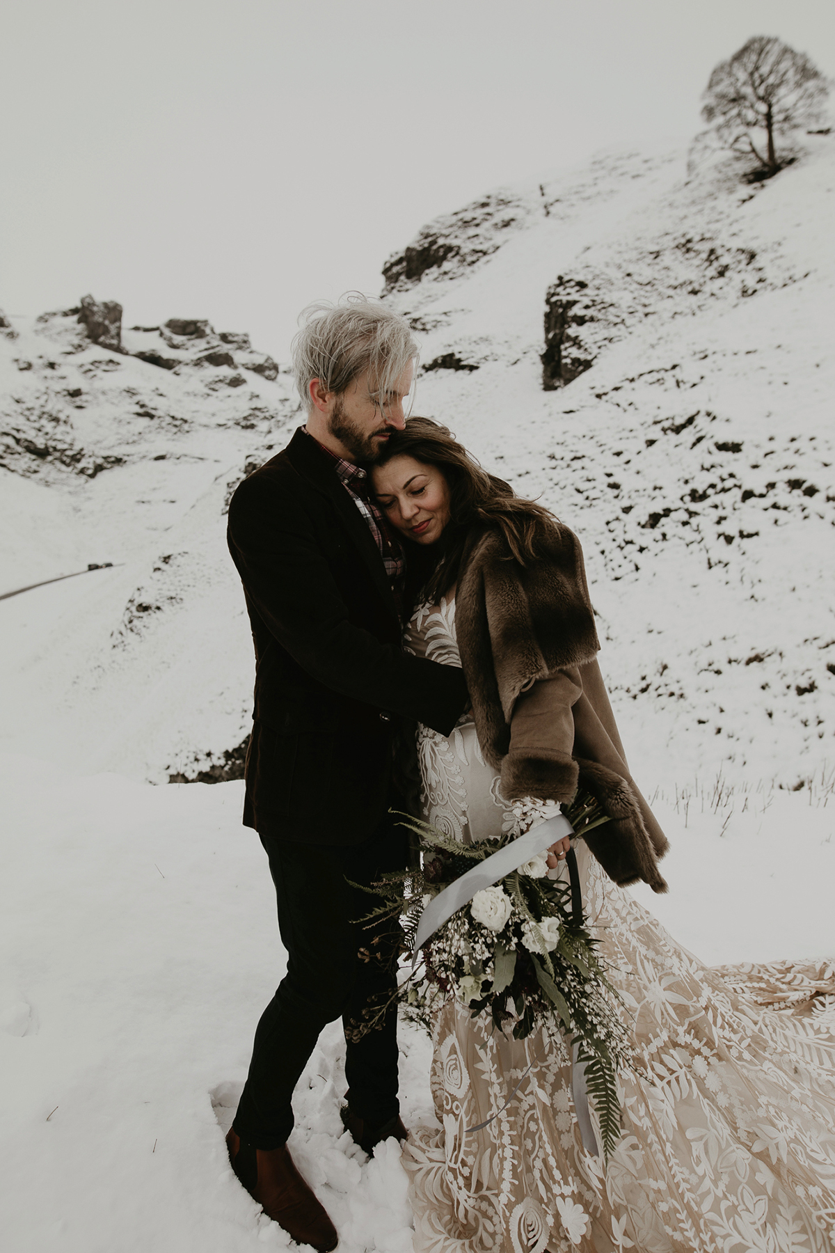 18 A Rue de Seine dress for a snowy vow renewal in the Peak District