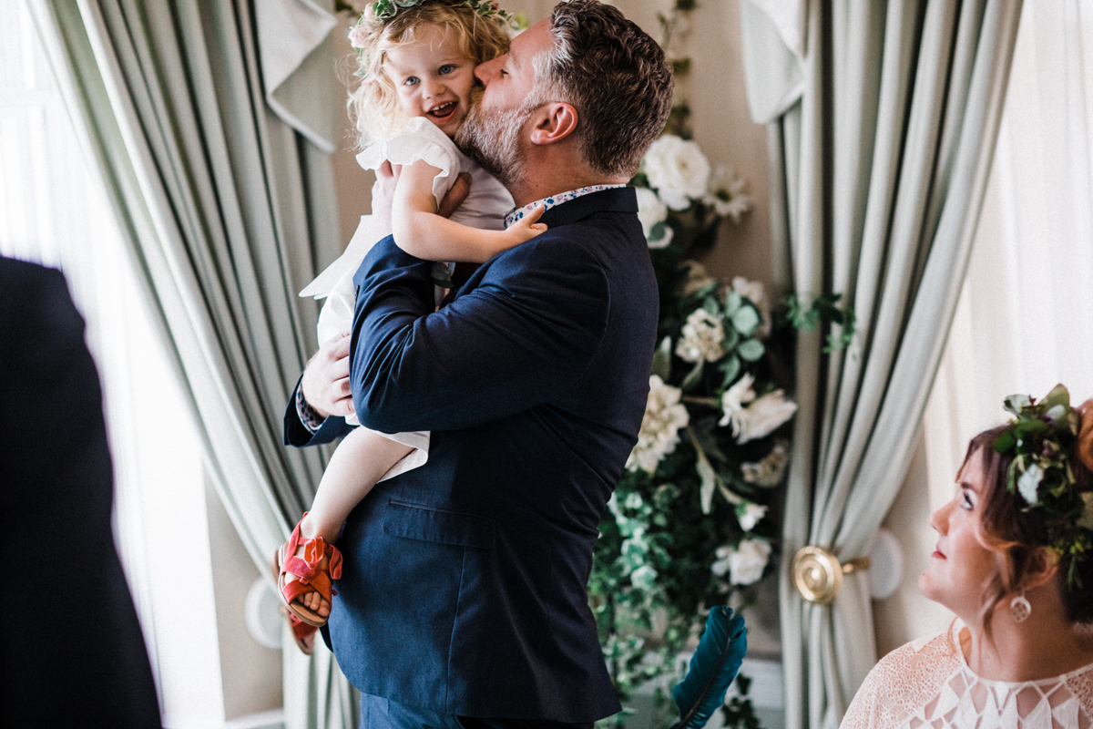 18 Groom kissing the flowergirl