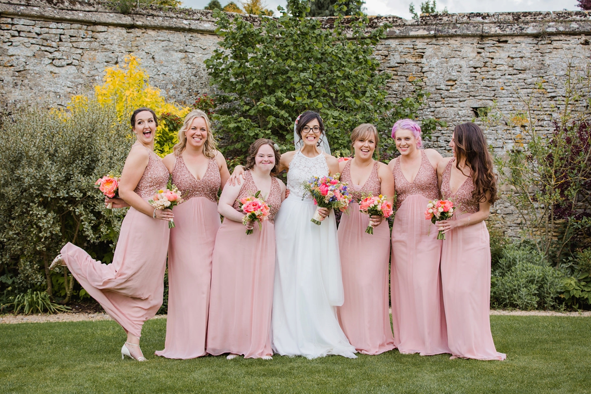 19 Bridesmaids in dusky pink halterneck gowns from Monsoon 1