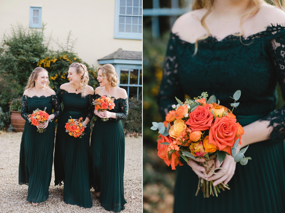 19 Bridesmaids in pleated bottle green dresses by Coast with orange Autumn wedding bouquets