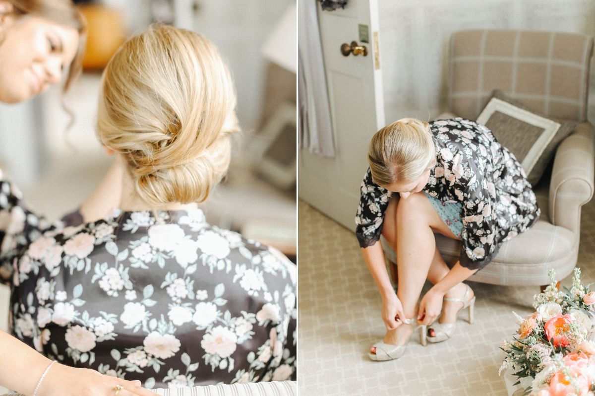 2 Elegant bridal up do with hair gently swept into a low bun 1