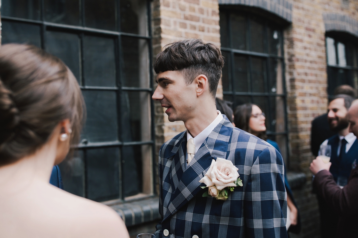 21 Groom with pink buttonhold and Mark Powell suit