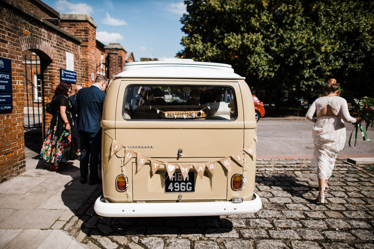 22 Beige VW camper van with wedding bunting