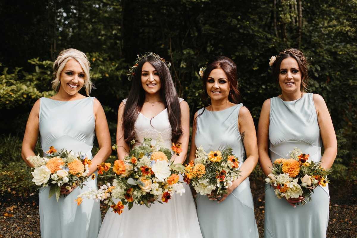 22 Bridesmaids in Ghost and bride in Suzanne Neville