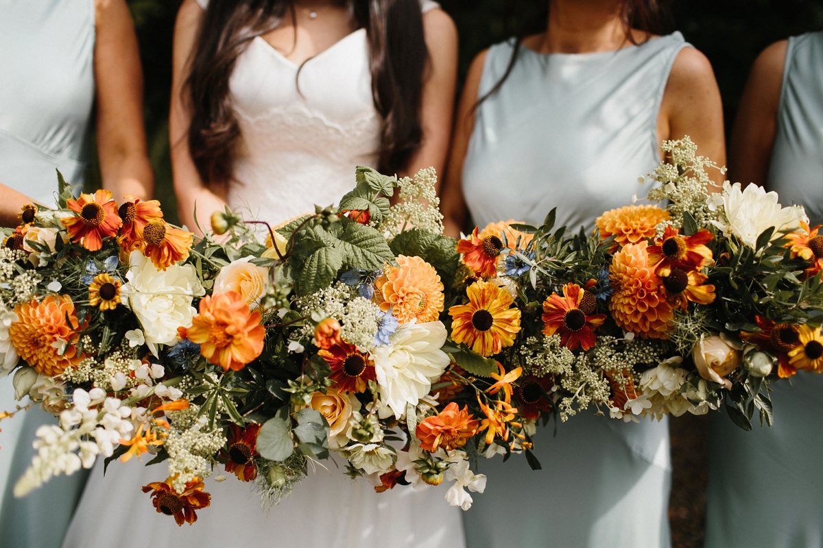 23 Orange wedding party bouquets