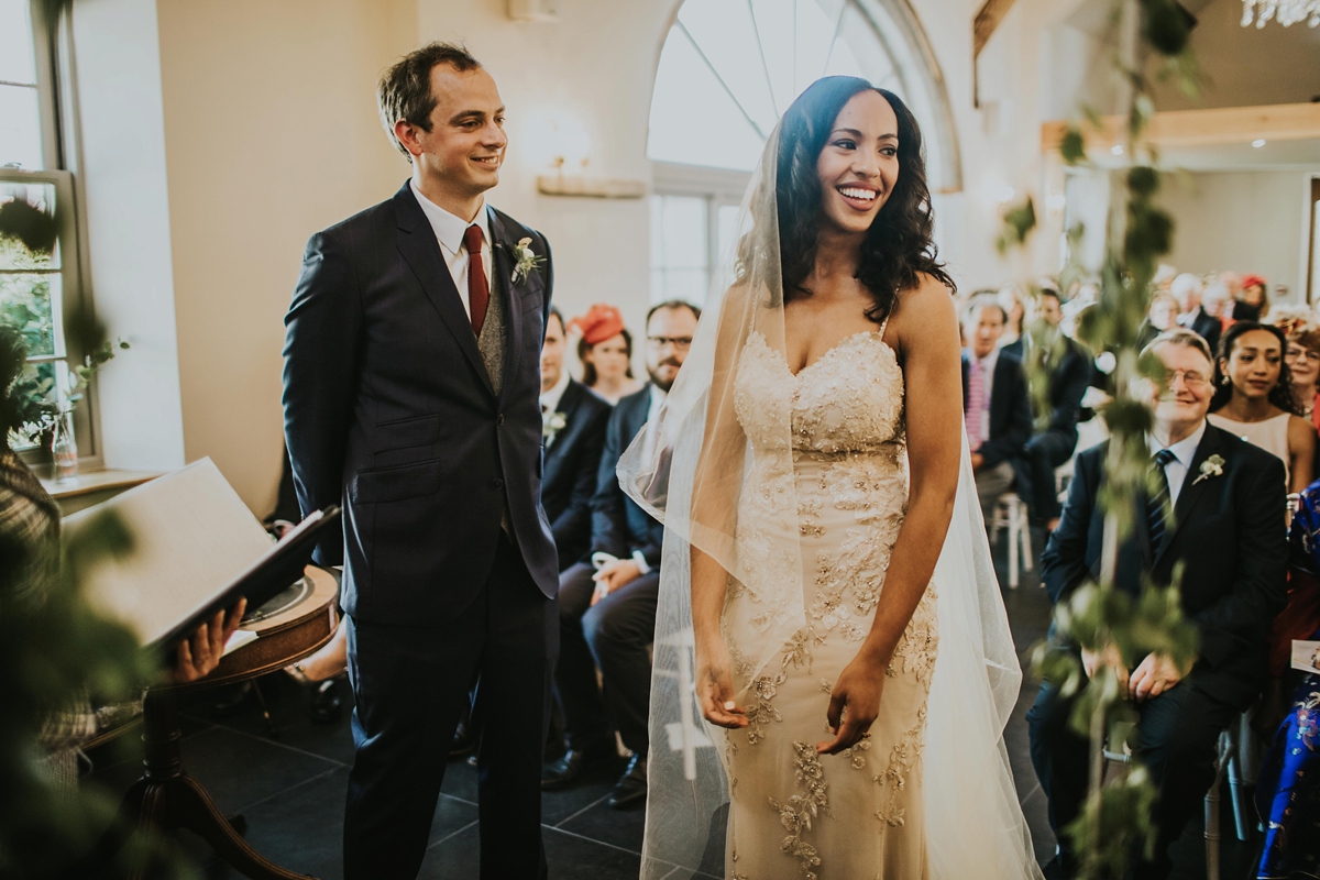 24 Couple during their Lemore Manor wedding ceremony