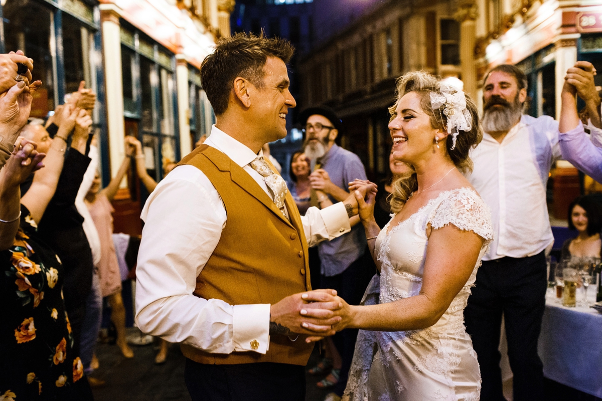25 Bride and grooms first dance - A Sharon Hoey Dress and French Lace Veil for a Glamorous and Elegant City Wedding 25 Bride and grooms first dance