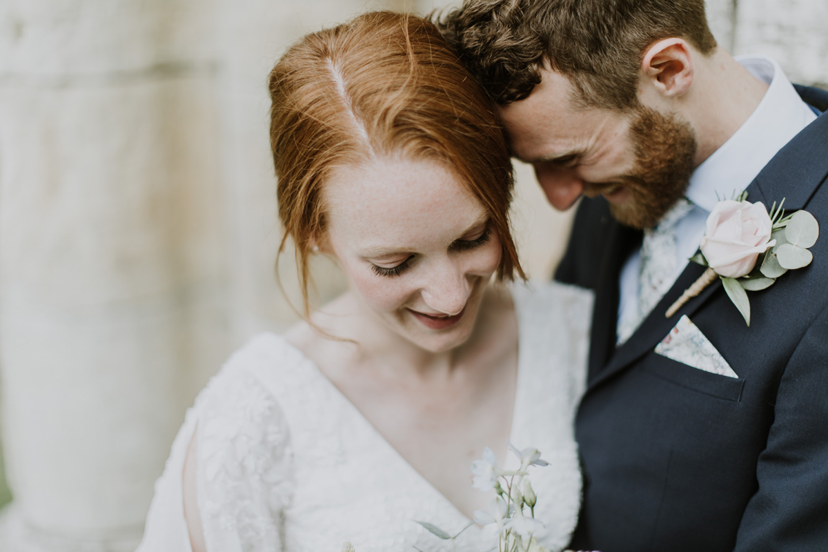 33 Newlywed couple embracing