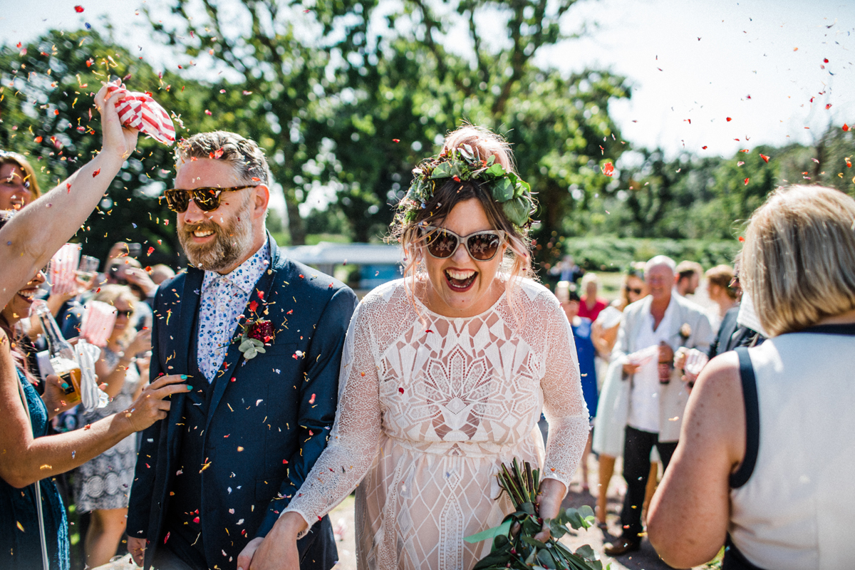 44 Confetti shot and bride in Grace Loves Lace and sunglasses