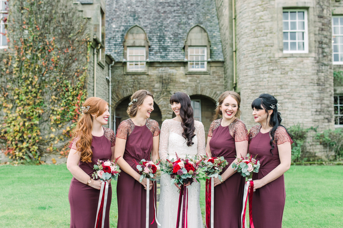 48 Bride in Rosa Clara and bridesmaids in burgundy Biba dresses