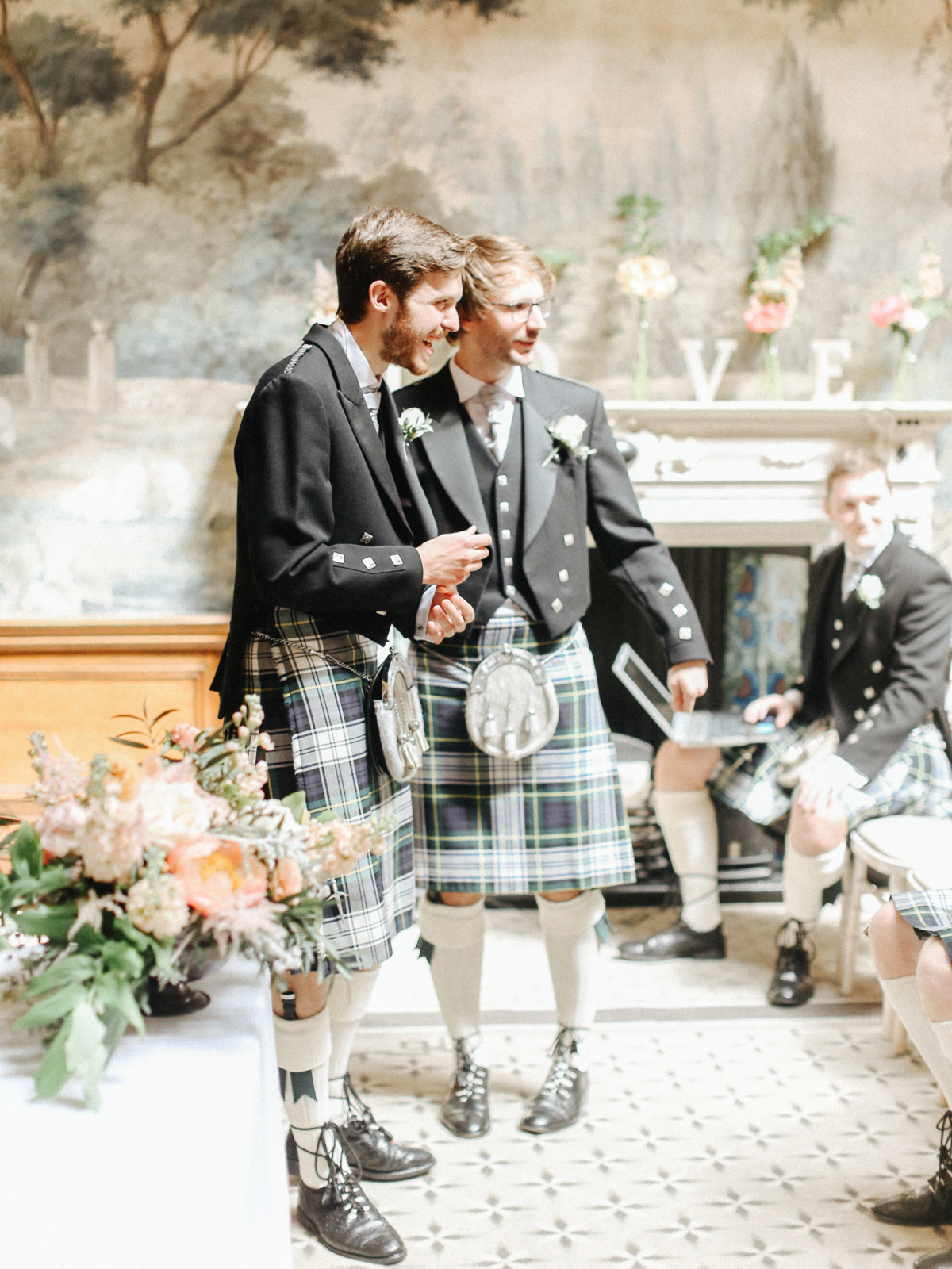 55 Groom and best man in green tartan kilts