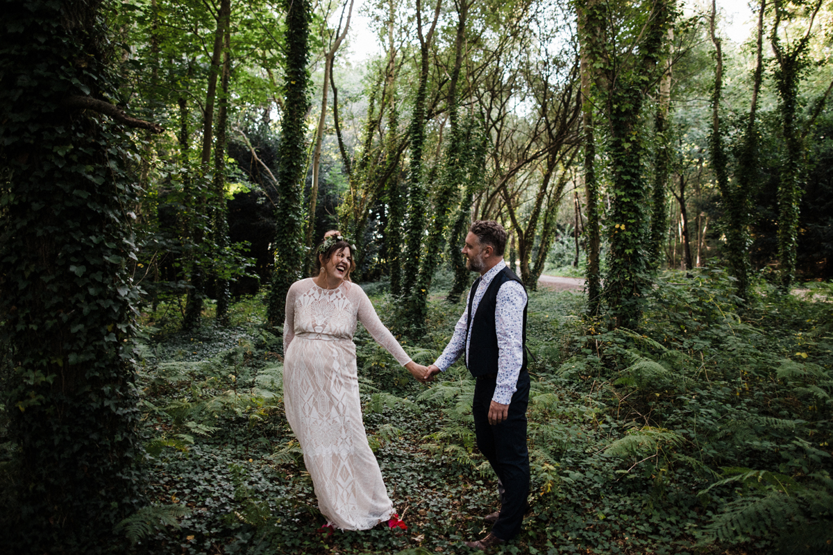 59 Graces Loves Lace bride in the woods with her groom for portrait shots