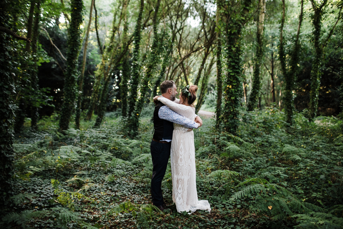 60 Graces Loves Lace bride in the woods with her groom for portrait shots