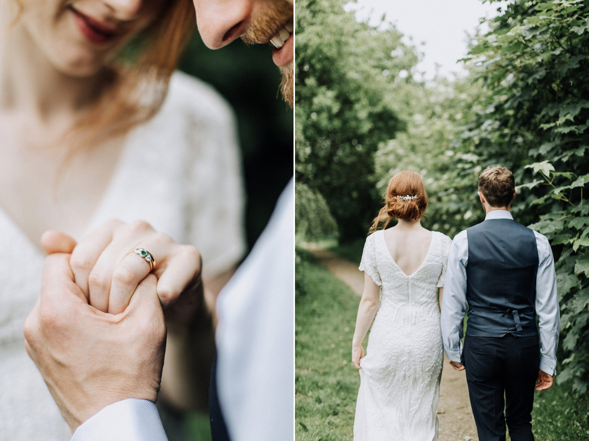 65 Newlywed couple looking at the brides wedding ring