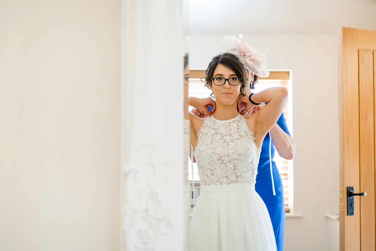 8 Bride wearing glasses and a Lambert Creations wedding dress 1