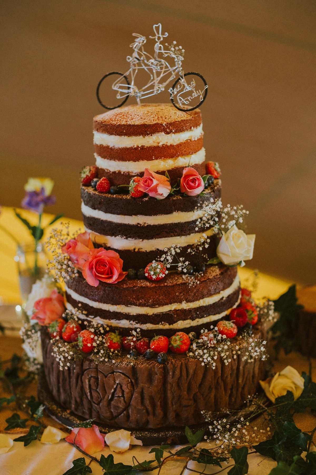 8 Naked wedding cake with bicycle cake topper