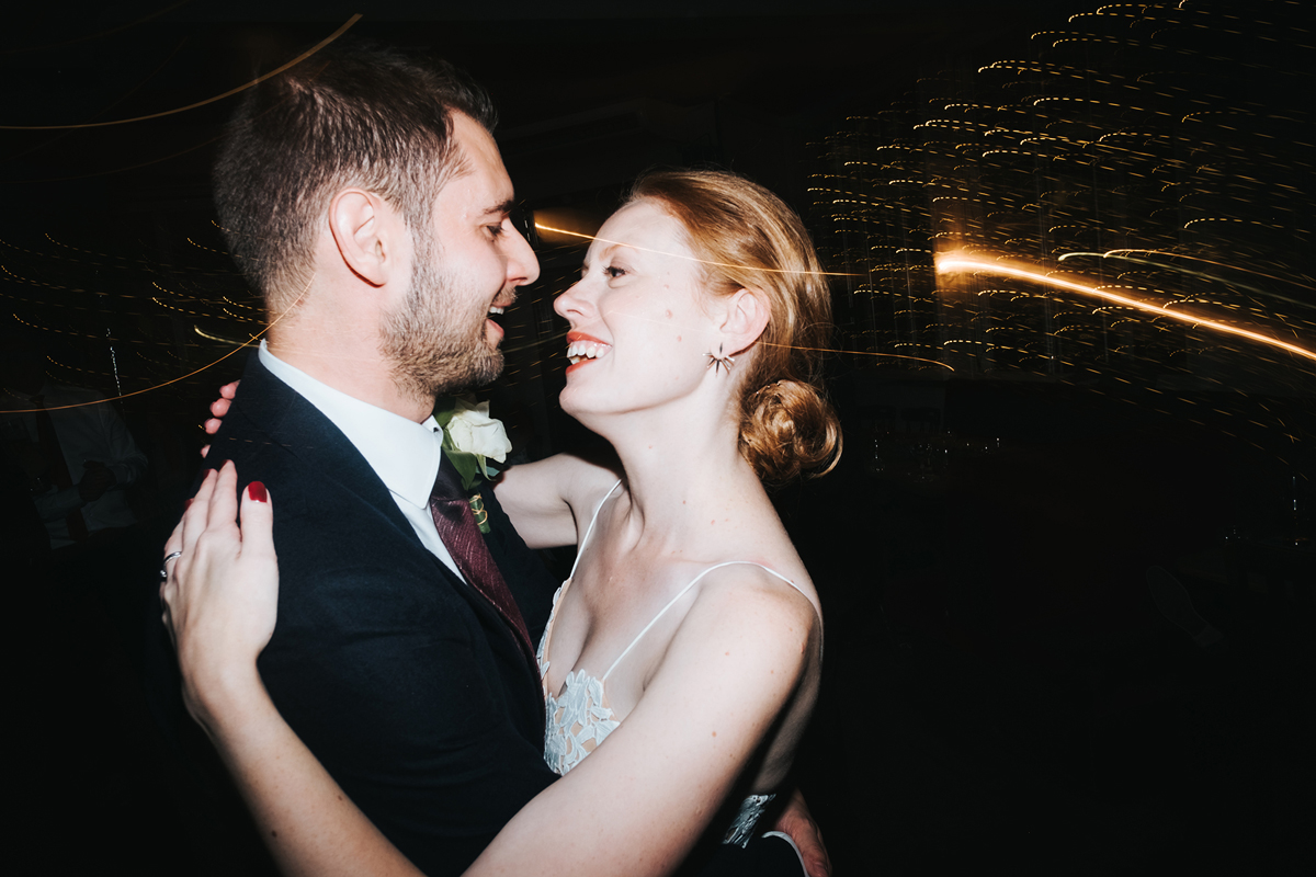 Bride and groom first dance at a laidback and intimate London wedding