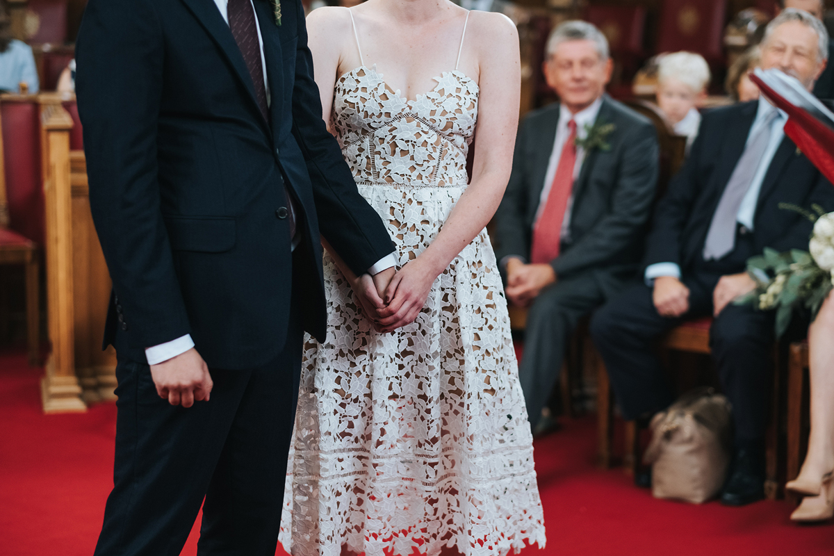 Couple during their wedding ceremony at Islington Town Hall