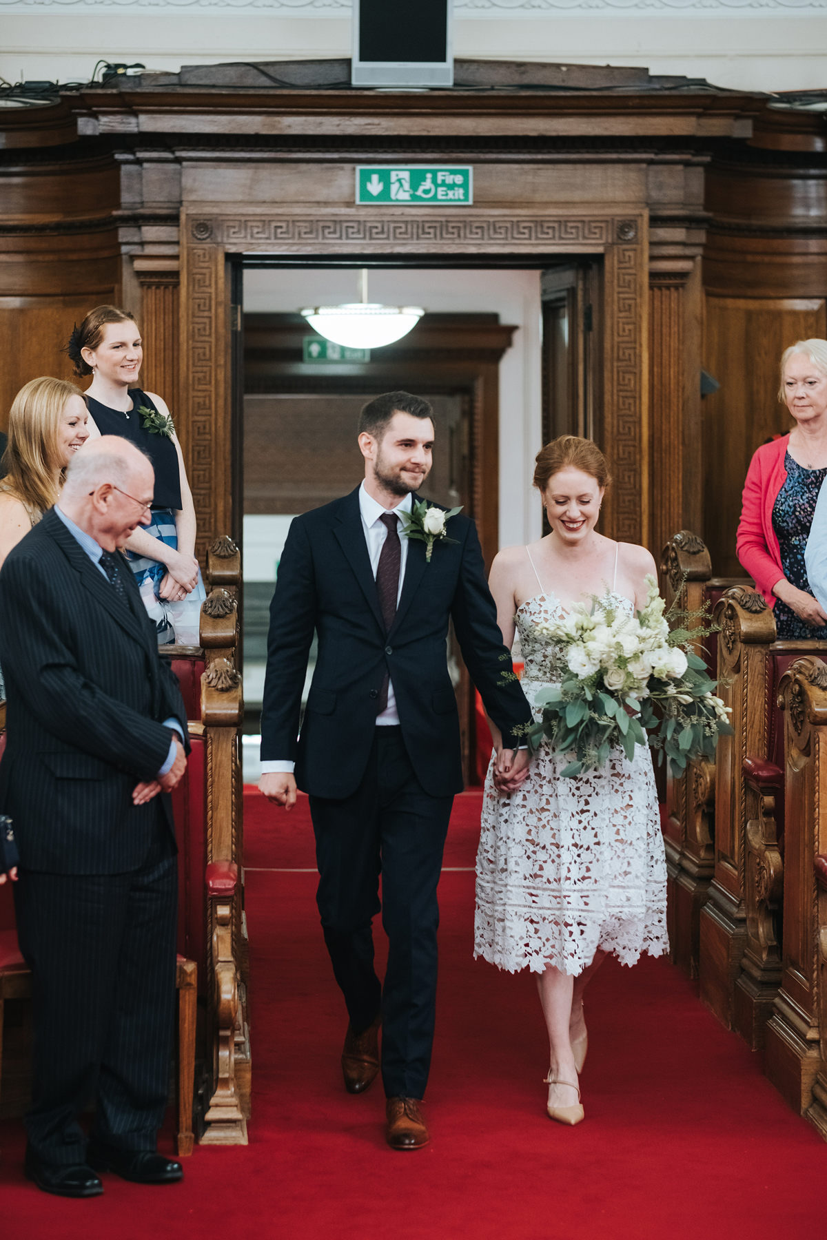 Couple entering the ceremony together at Islington Town Hall