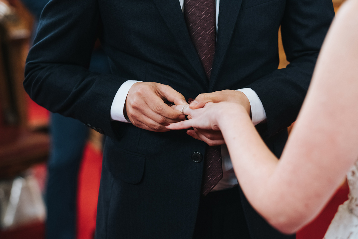 Exchanging wedding rings at Islington Town Hall