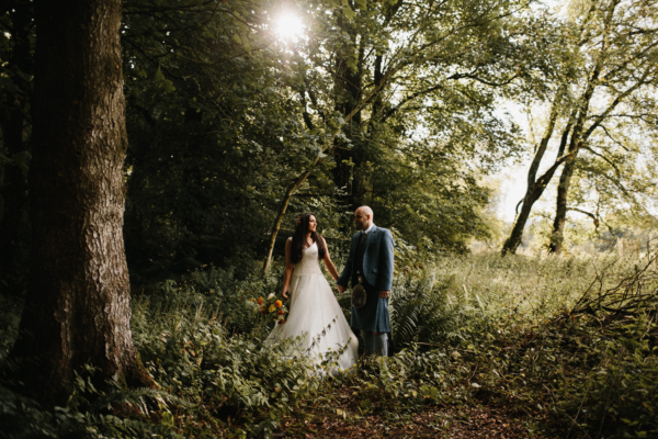 A Suzanne Neville gown for a Colourful, Handmade and Woodland-Inspired Wedding