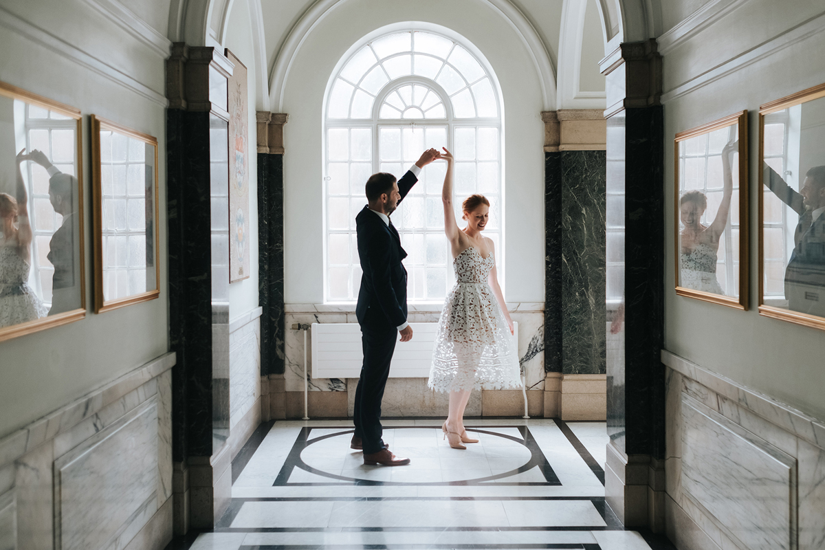 Newlywed couple dancing at Islington Town Hall