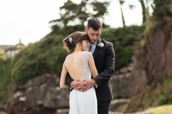 An Elegant Backless Pronovias Gown and Maids in Sage Green