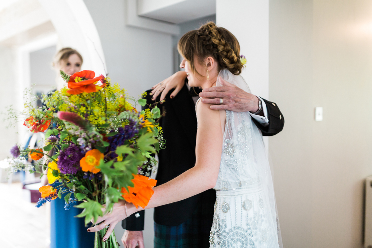 11 Beaded 1920s inspired wedding dress and colourful barn wedding