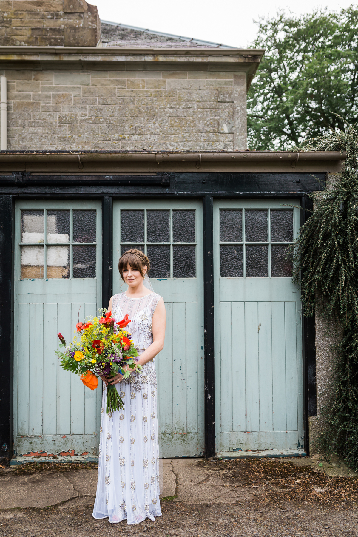 16 Beaded 1920s inspired wedding dress and colourful barn wedding