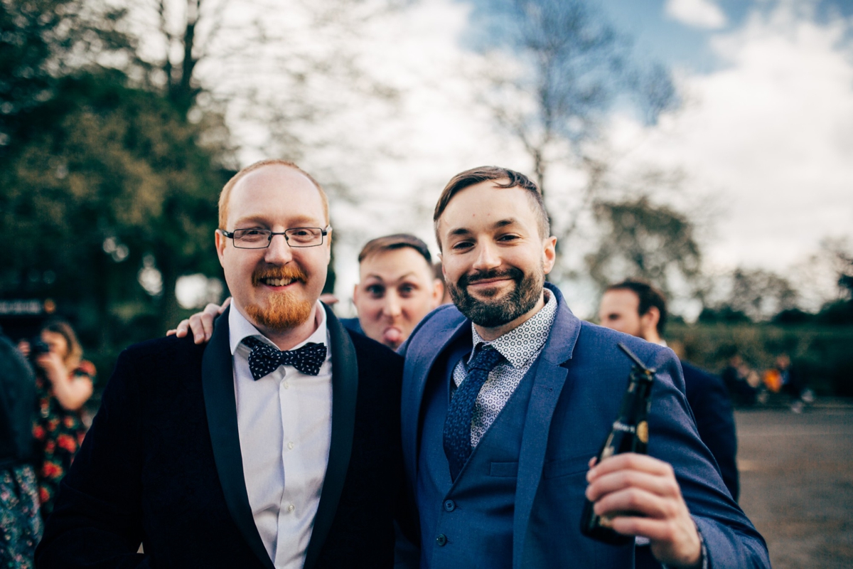 23 Happy wedding guests in bow ties