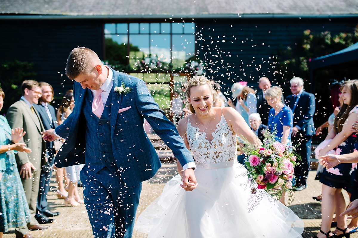 27 A Blush by Hayley Paige bride and her elegant barn wedding