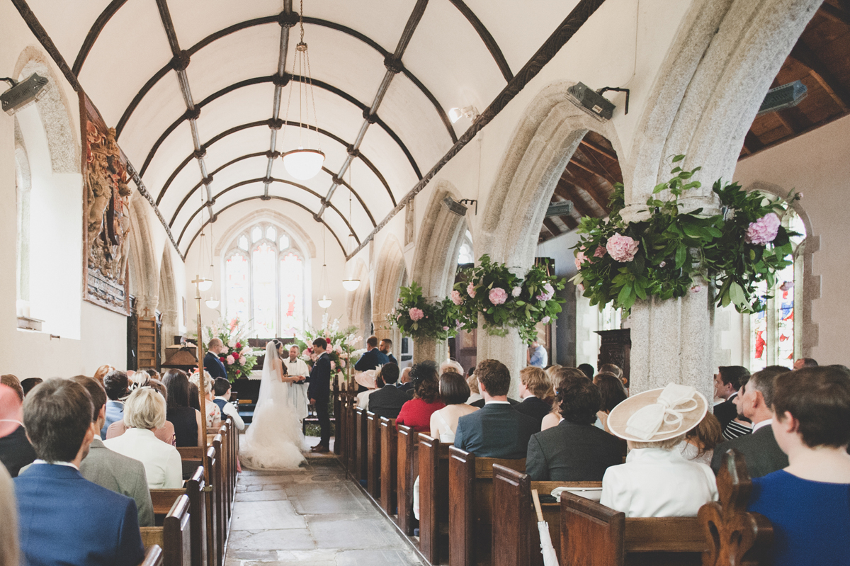 27 A Pronovias dress for a flower filled and Parisian inspired wedding