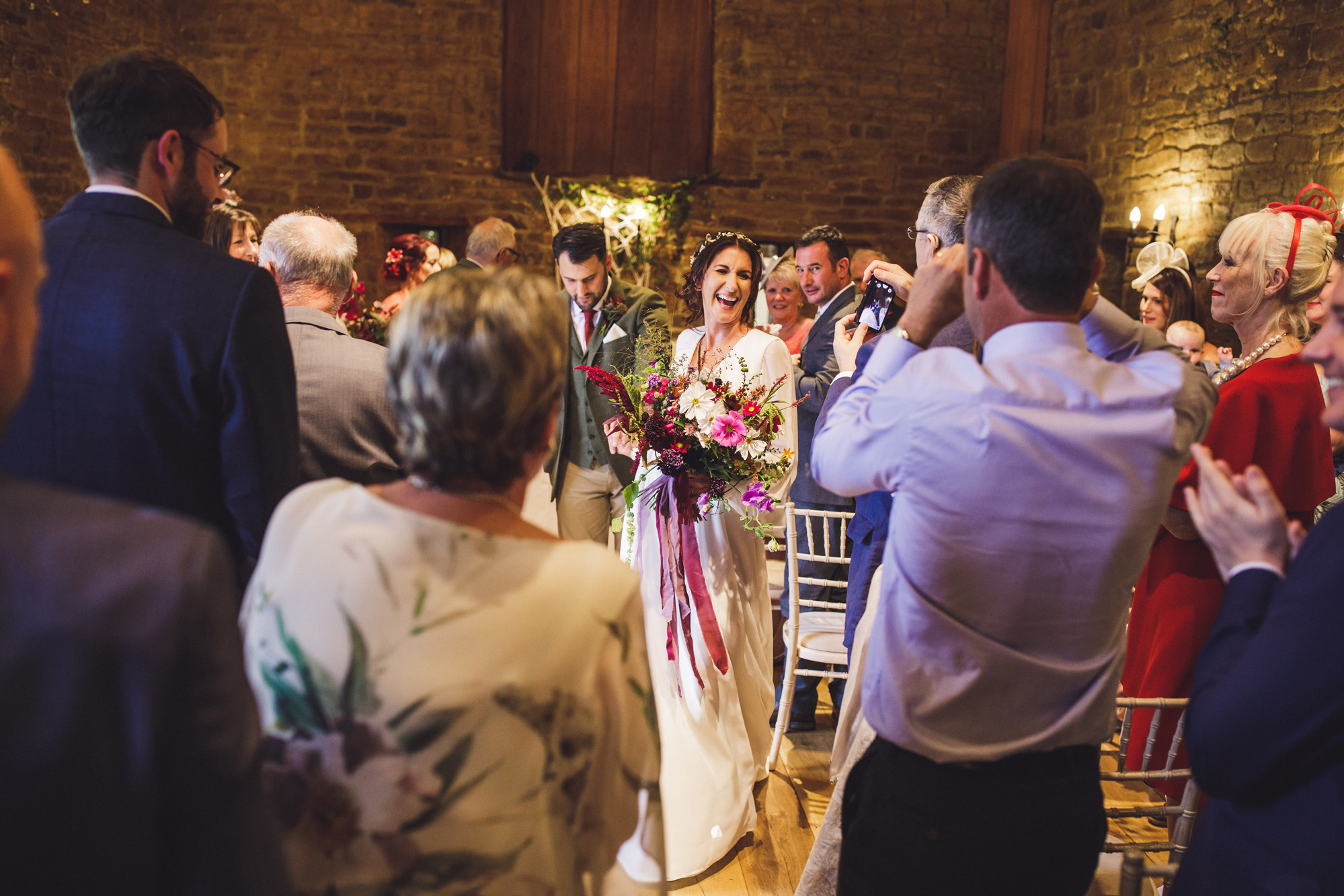 28 A 70s boho bride and her music inspired farm wedding