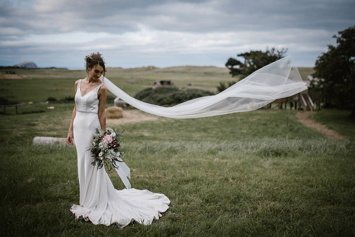 36 A Justin Alexander gown for a romantic outdoor wedding
