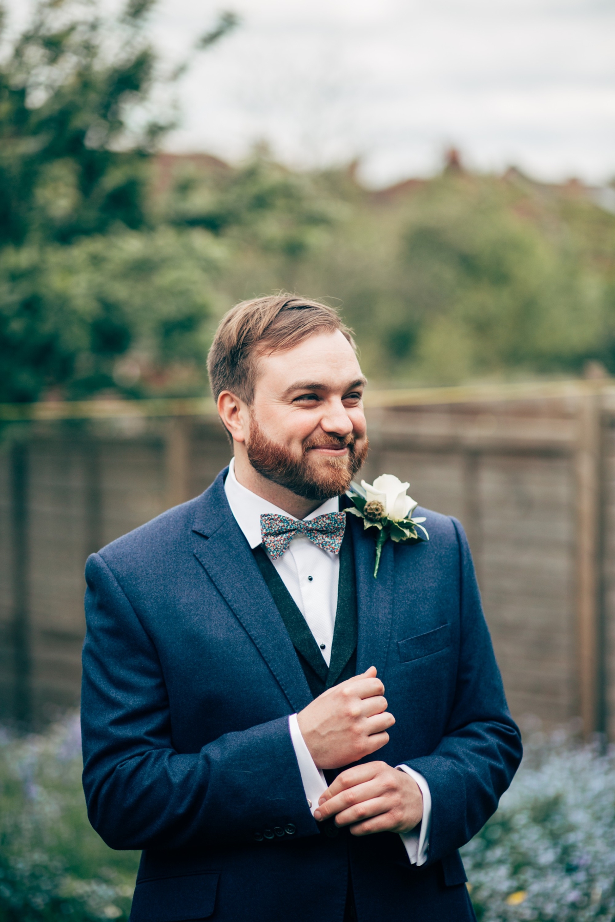 4 Groom wearing an MS suit and Liberty print tie