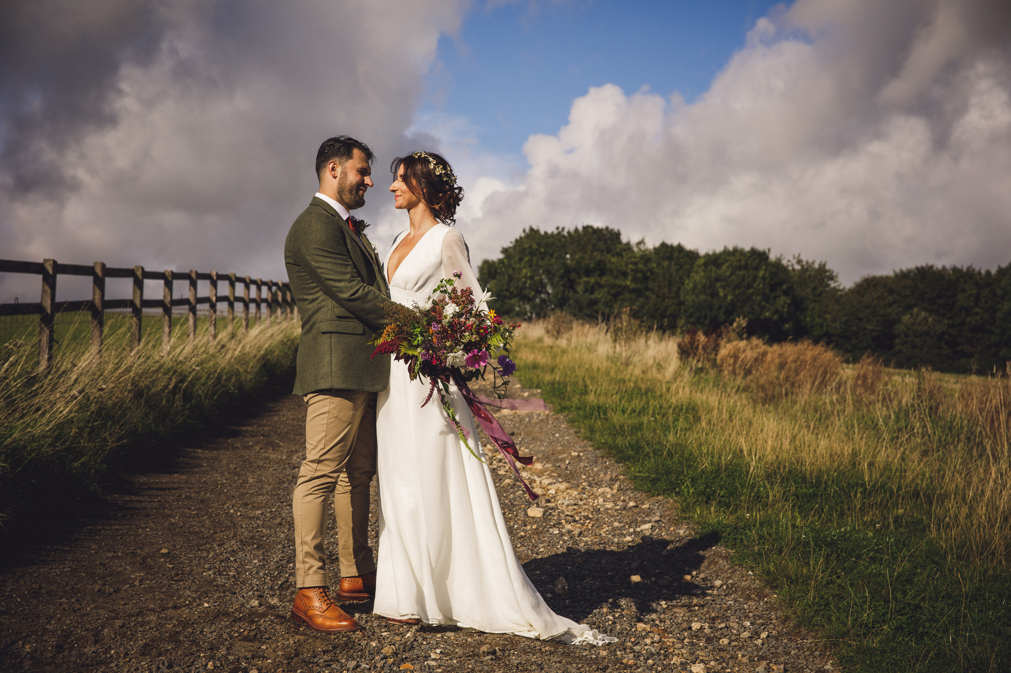 47 A 70s boho bride and her music inspired farm wedding