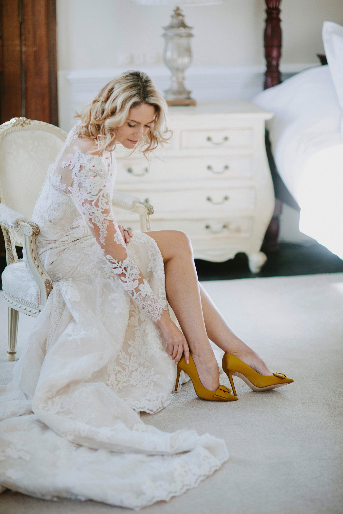 Pronovias worn by a beautiful mature bride with yellow shoes