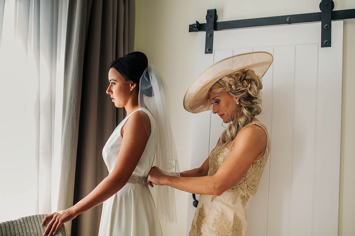 10 A Charlie Brear dress for a timeless Beachside wedding in greens and neutrals