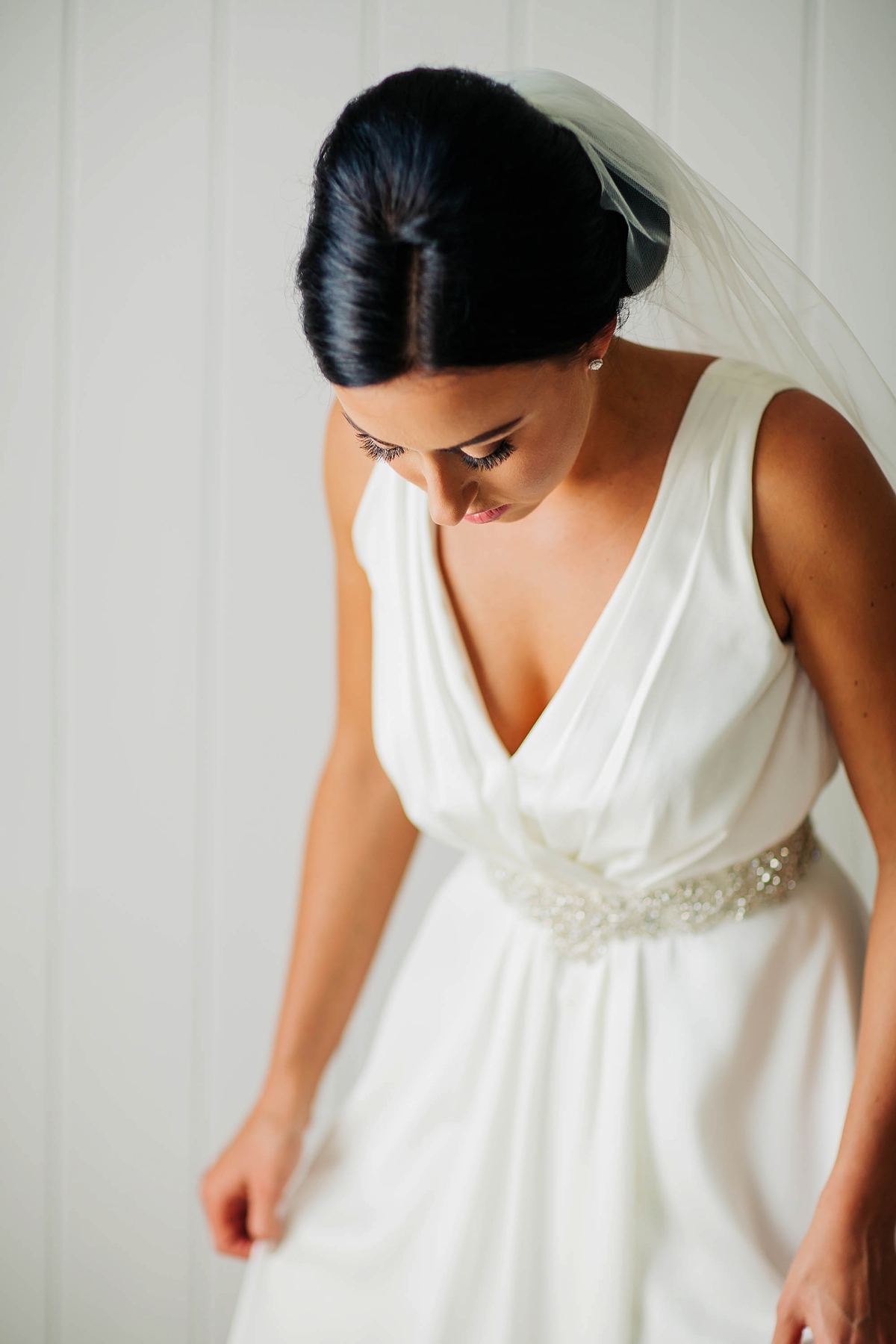 11 A Charlie Brear dress for a timeless Beachside wedding in greens and neutrals