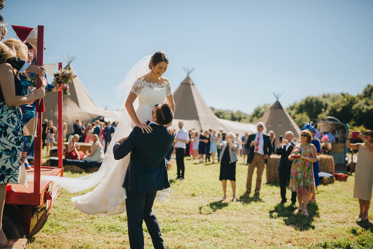 13 A Sassi Holford gown for a festival style tipi wedding