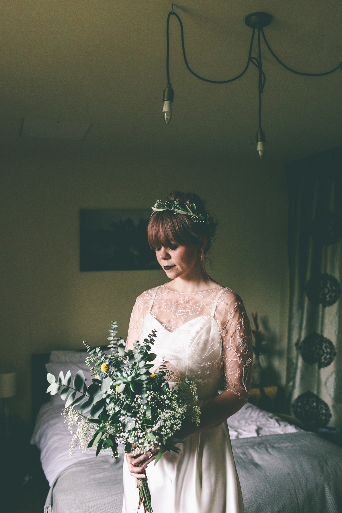 14 A bride in a selfmade jumpsuit for her industrial warehouse wedding in Manchester