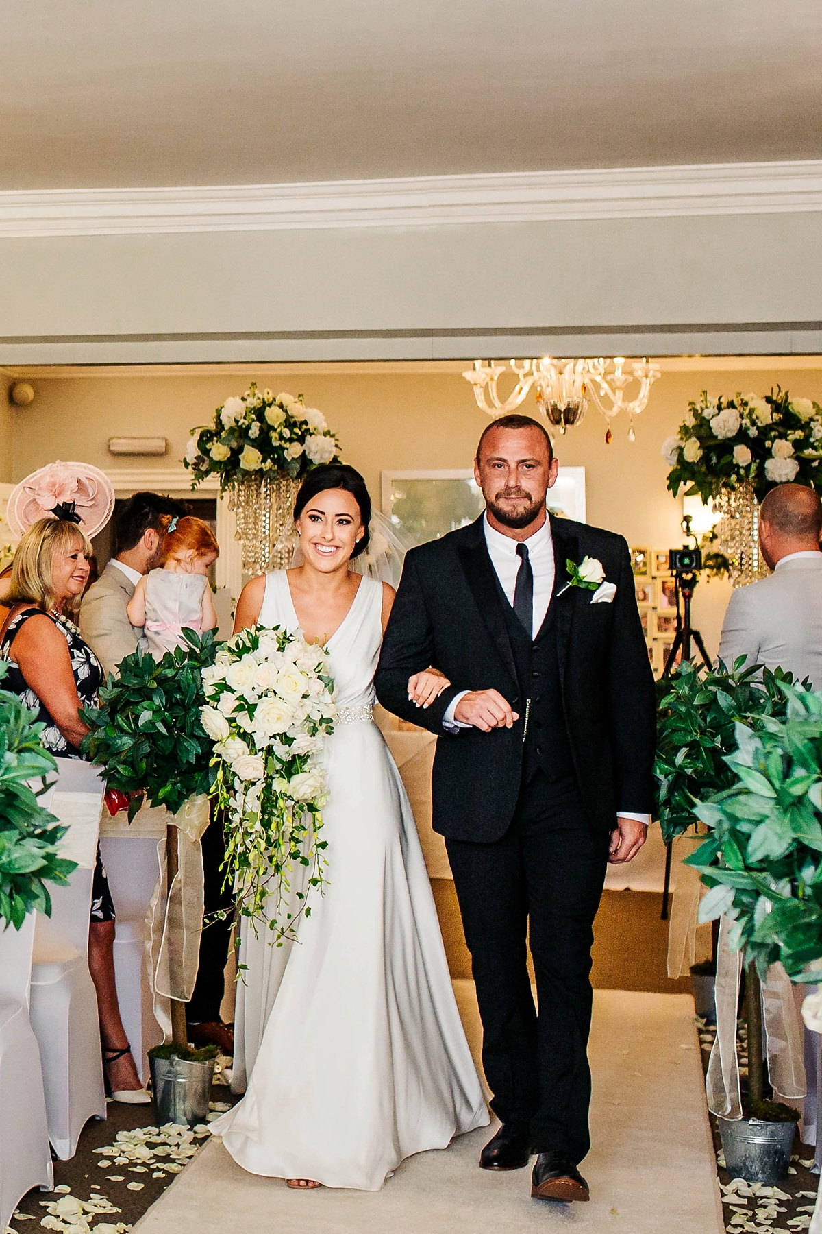 15 A Charlie Brear dress for a timeless Beachside wedding in greens and neutrals