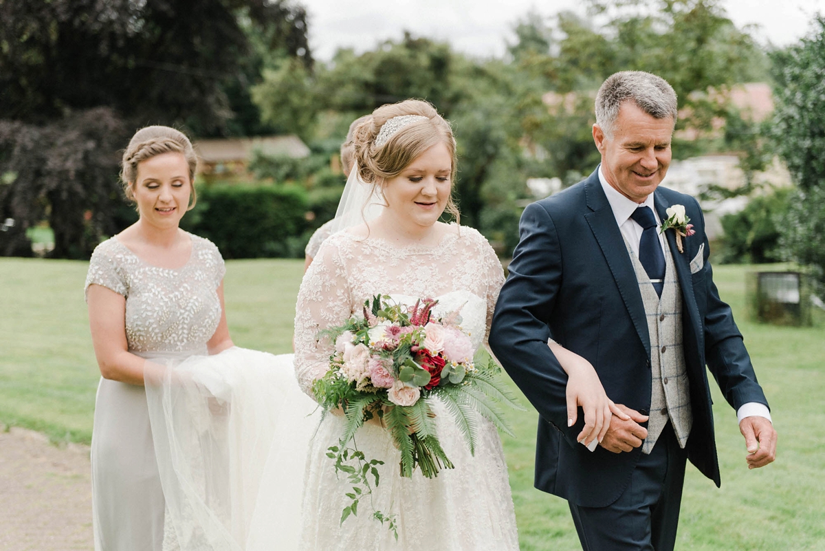 15 A bride who made her own dress for her elegant garden party wedding