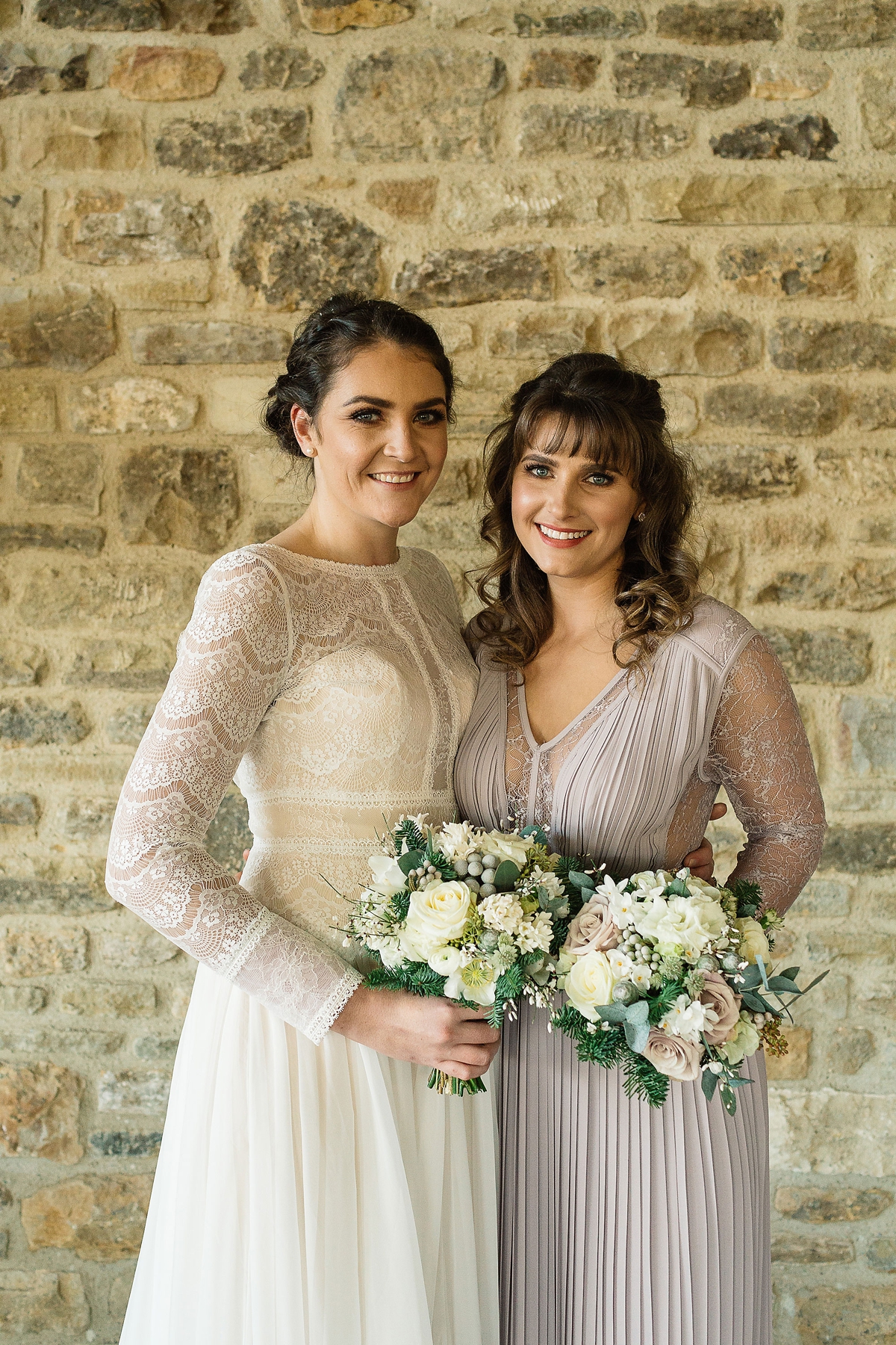 16 A Long sleeved Maggie Sottero dress for a candle lit winter barn wedding