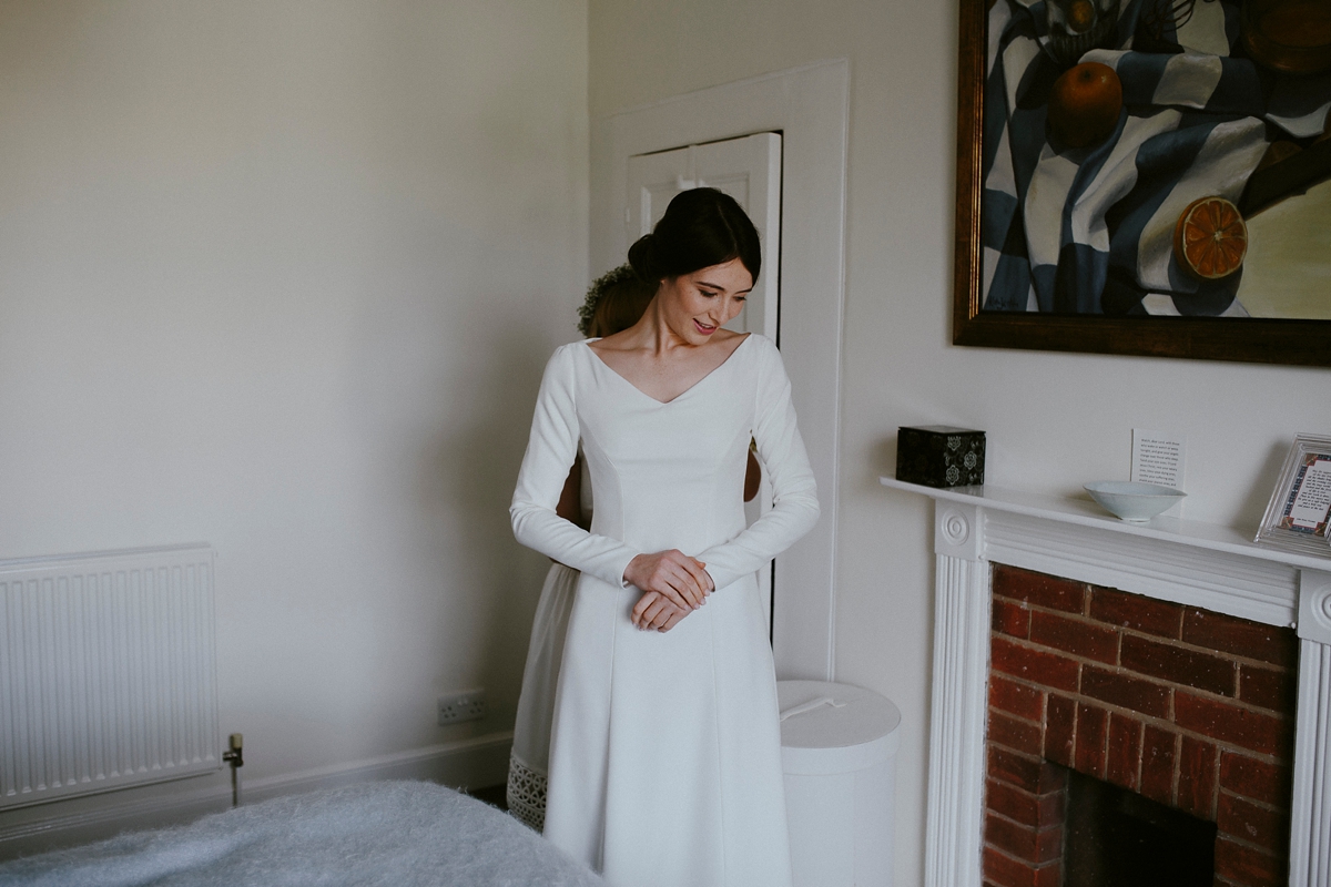 16 A bespoke long sleeved dress and vintage Whistles coat for an effotlessly elegant Cambridge wedding